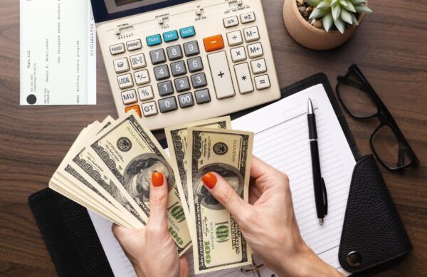 close-up-hands-counting-money