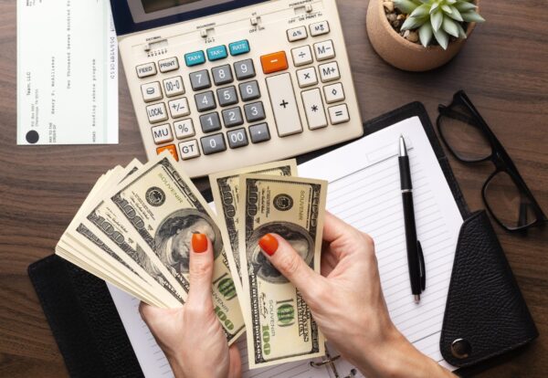 close-up-hands-counting-money